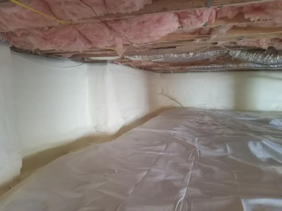 Crawl space encapsulation with closed-cell spray foam for Commercial Roof Restoration in Kensington